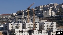 FILE - This picture shows ongoing construction work at Ramat Shlomo, a Jewish settlement in the Israeli-annexed eastern sector of Jerusalem, Dec. 30, 2022.