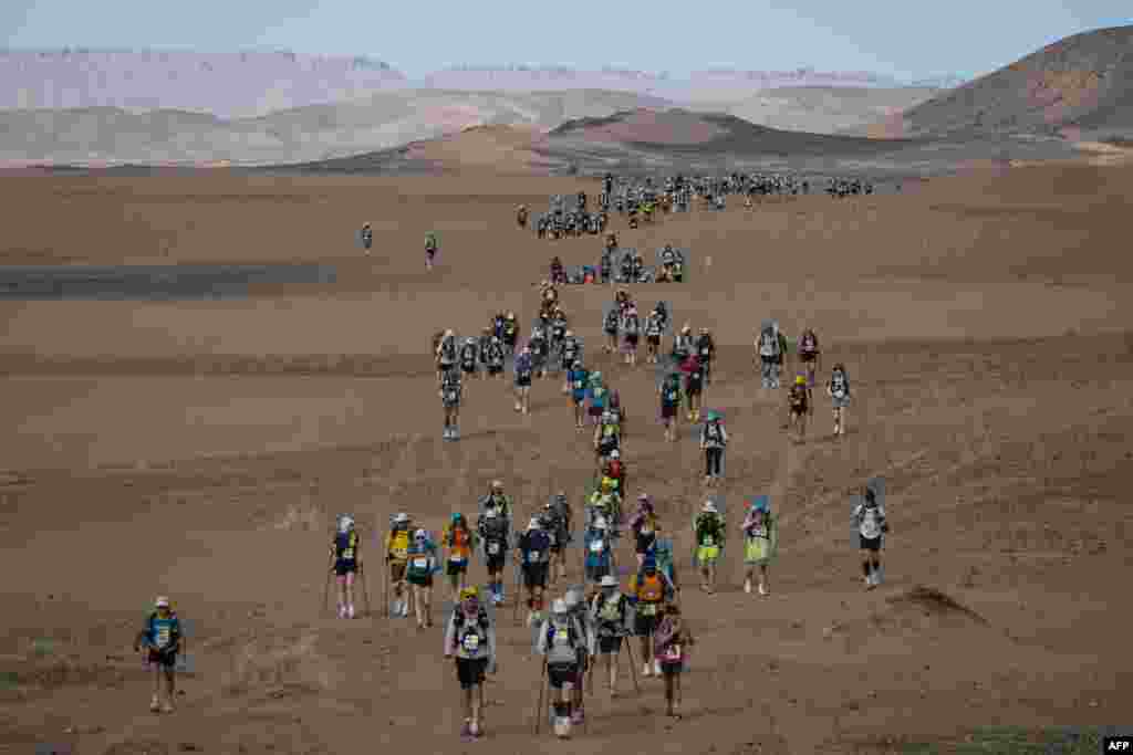 Competitors take part in stage 5 of the 37th edition of the Marathon des Sables between Jdaid and Kourci Dial Zaid in the Moroccan Sahara desert, near Merzouga central Morocco.&nbsp;