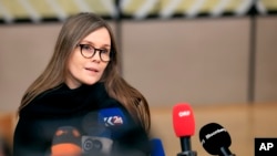 FILE - Iceland's Prime Minister Katrin Jakobsdottir speaks with the media as she arrives for an EU Summit in Brussels, on March 22, 2024. 