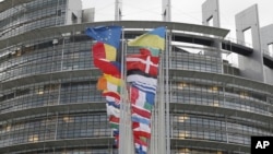 FILE - European flags fly outside the European Parliament on Feb. 7, 2024, in Strasbourg, eastern France. 