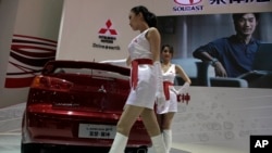 资料照：北京汽车展上的日产汽车展台 （2010年4月24日）