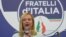 FILE - Far-right party Brothers of Italy's leader Giorgia Meloni speaks to the media at her party's electoral headquarters in Rome, Sept. 26, 2022.