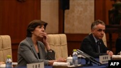 French Foreign Minister Catherine Colonna, left, attends a meeting in the Diaoyutai State Guesthouse in Beijing, April 5, 2023. 