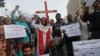 FILE - Members of the Christian community chant protest as they condemn attacks on Christians during a protest in Karachi, Pakistan, Aug. 17, 2023. On June 3, 2024, a 70-year-old Christian man died after being attacked by a Muslim mob outside Islamabad.