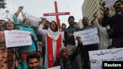FILE - Members of the Christian community chant protest as they condemn attacks on Christians during a protest in Karachi, Pakistan, Aug. 17, 2023. On June 3, 2024, a 70-year-old Christian man died after being attacked by a Muslim mob outside Islamabad.