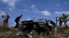 西岸地区图勒凯尔姆城以北一辆汽车在一次无人机攻击中被摧毁。(2024年8月3日)