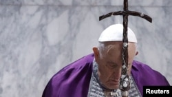 FILE - Pope Francis attends the Ash Wednesday mass at the Santa Sabina Basilica in Rome, Italy, February 22, 2023. 