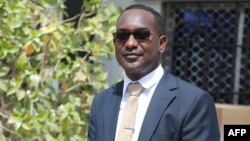 Abdalle Ahmed Mumin poses outside the Banadir regional court headquarters in Mogadishu on Jan. 4, 2023.