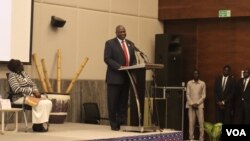 FILE - South Sudan First Vice President Riek Machar addresses the International Conference on Women's Transformational Leadership attended by more than 400 women leaders from across Africa, in Juba, South Sudan, Feb. 15, 2023. (VOA/Juliana Siapai)