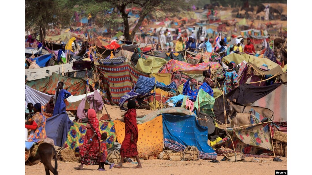 FILE - Sudanese refugees who fled the conflict in Sudan's Darfur region are seen in a makeshift camp near the border between Sudan and Chad, May 13, 2023.