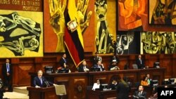 Ecuador's President Guillermo Lasso speaks during his political trial at the National Assembly headquarters in Quito on May 16, 2023. 