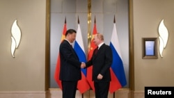 Президент России Владимир Путин и председатель КНР Си Цзиньпин на переговорах в Астане, 3 июля 2024 года.