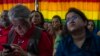 In Mumbai, India, supporters and members of the LGBTQ community react as they watch a screen showing the Supreme Court's rejection of the legalization of same-sex marriage on Oct. 17, 2023.