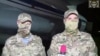FILE — Screenshot taken from video from RTN, showing Russian military instructors who were speaking to media after they arrived in Niamey, Niger, on April 10, 2024.