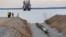 FILE - A view of the Balticconector pipeline as it is pulled into the sea in Paldiski, Estonia, in an undated handout photo taken in 2019. (Elering via Reuters)