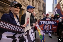 Supporters of former President Donald Trump protest outside of Trump Tower in New York City, April. 3, 2023.