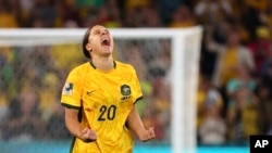 Australia's Sam Kerr celebrates after scoring during a penalty shootout in the Women's World Cup quarterfinal soccer match against France in Brisbane, Australia, on Aug. 12, 2023.