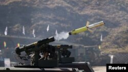 FILE - a South Korea-made AT-1K Raybolt is fired during a military exercise held as part of Defense Expo Korea at a training ground in Pocheon, South Korea, Sept. 20, 2022.