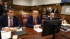 Former President Donald Trump, flanked by his lawyers, appears in State Supreme Court in New York, April 15, 2024, for the first day of his trial on charges of falsifying business records. (Jefferson Siegel/Pool Photo via AP)
