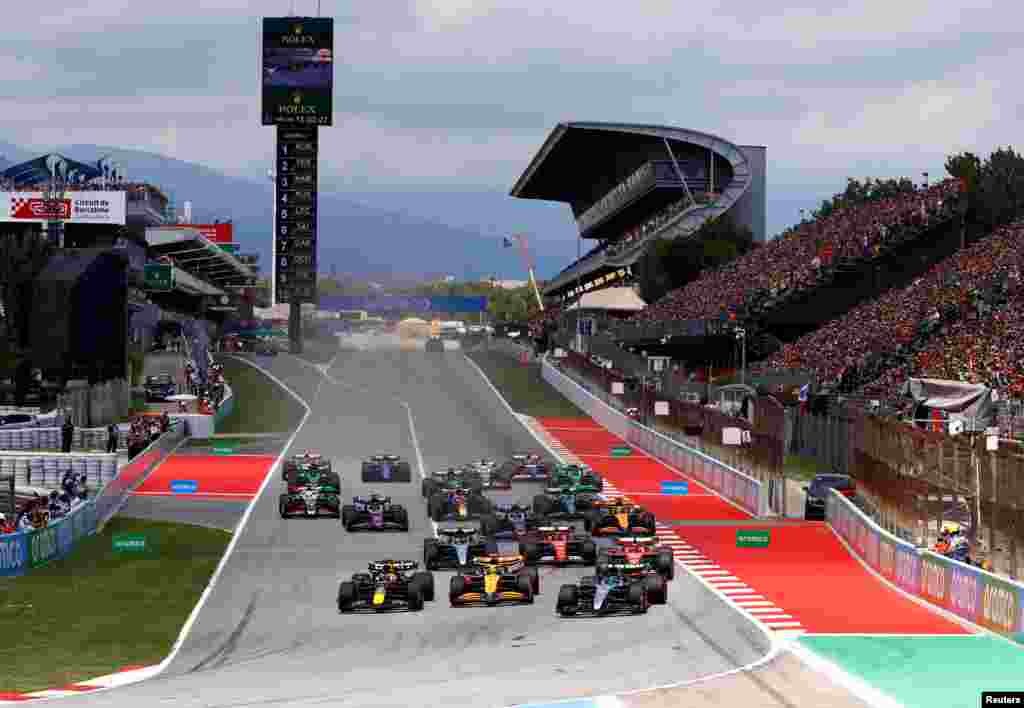 Red Bull&#39;s Max Verstappen, McLaren&#39;s Lando Norris and Mercedes&#39; George Russell lead the Formula 1 Spanish Grand Prix at the Barcelona Catalunya racetrack in Montmelo, near Barcelona, Spain.