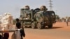 FILE - A French Army vehicle moves through Niamey, Niger, on Oct. 10, 2023, to a destination that could be Chad, according to security sources. Opposition and civil society groups in Chad are asking France to remove troops already stationed in Chad and those arriving from Niger.