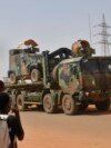 FILE - A French Army vehicle moves through Niamey, Niger, on Oct. 10, 2023, to a destination that could be Chad, according to security sources. Opposition and civil society groups in Chad are asking France to remove troops already stationed in Chad and those arriving from Niger.
