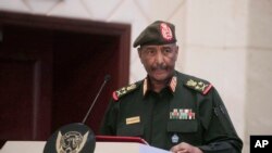 FILE - Sudan's Army chief Gen. Abdel-Fattah al-Burhan speaks following a deal aimed at ending a deep crisis caused by last year's military coup, in Khartoum, Sudan, Dec. 5, 2022.