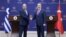 Turkish Foreign Minister Hakan Fidan, right, shakes hands with his Greek counterpart, Giorgos Gerapetritis, during their press conference in Ankara, Turkey, Sept. 5, 2023.