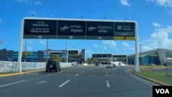 The entrance sign for Luis Munoz Marin International Airport is seen in Carolina, Puerto Rico, (Salome Ramirez/VOA)