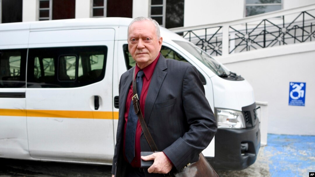 FILE - Juergen Mossack, partner of the law firm Mossack-Fonseca, leaves the Supreme Court during the trial of the Panama Papers money-laundering case in Panama City, April 8, 2024. 
