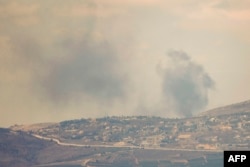 This picture taken from northern Israel shows smoke billowing during Israeli bombardment in southern Lebanon on Aug. 4, 2024, amid ongoing cross-border clashes between Israeli troops and Lebanon's Hezbollah fighters.