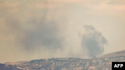 This picture taken from northern Israel shows smoke billowing during Israeli bombardment in southern Lebanon on Aug. 4, 2024, amid ongoing cross-border clashes between Israeli troops and Lebanon's Hezbollah fighters.