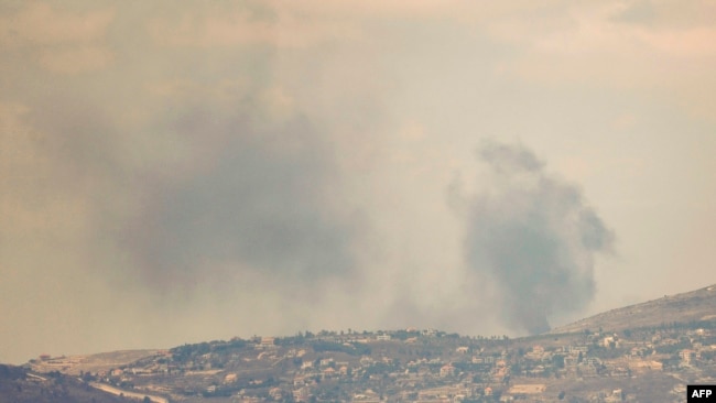 This picture taken from northern Israel shows smoke billowing during Israeli bombardment in southern Lebanon on Aug. 4, 2024, amid ongoing cross-border clashes between Israeli troops and Lebanon's Hezbollah fighters.