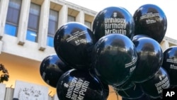 FILE - Balloons hang outside the Russian Embassy in Paris, Oct. 6, 2021, during a Reporters Without Borders tribute to a Russian journalist slain years before in Moscow. Russia has blocked access to the RSF website, the group said April 22, 2024.