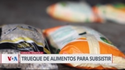 Venezolanos intercambian alimentos de las polémicas bolsas CLAP para subsistir