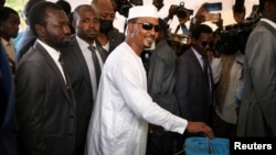 FILE - Chadian President Mahamat Idriss Deby casts his vote for the presidential elections in N’Djamena, Chad, May 6, 2024.
