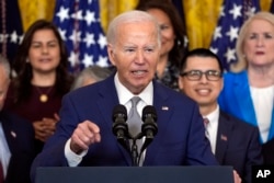 U.S. President Joe Biden speaks during an event marking the 12th anniversary of the Deferred Action of Childhood Arrivals program at the White House on June 18, 2024, in Washington.