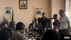 Zimbabwe journalists are seen at the country's Zanu PF headquarters in Harare, May 23, 2023, discussing with ruling party officials how to ensure they are not targeted by political violence during elections later this year. (Columbus Mavhunga/VOA)