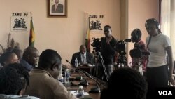 FILE - Journalists are seen gathered at Zanu-PF offices in Harare, Zimbabwe. (Columbus Mavhunga/VOA)