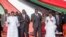 President William Ruto (center-right), First Lady Rachel Ruto (right), Deputy President Rigathi Gachagua (center-left) and his wife Dorcas Rigathi (left) pray during a national day of prayer event held at Nyayo stadium in the capital Nairobi, Kenya Tuesday, Feb. 14, 2023.