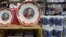 Coronation plates and mugs are displayed for sale in a gift shop in London, April 24, 2023. 