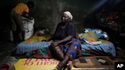 Funmilayo Kotun, 66, a malaria patient, is pictured in her room in the Makoko neighborhood of Lagos, Nigeria, April 20, 2024. Climate change is reviving the threat, or broadening the range, of some diseases, but across Africa, malaria has never left.
