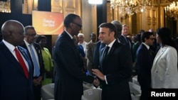 French President Emmanuel Macron, right, welcomes Rwanda's President Paul Kagame to the Global Forum for Vaccine Sovereignty and Innovation at the French Foreign Ministry in Paris, June 20, 2024. Macron and African leaders are working to make vaccines more available in Africa.