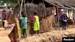 FILE - Sudanese children displaced by war stand at Zamzam camp in North Darfur, Sudan, on Aug. 1, 2024. The U.N. Security Council on Sept. 11, 2024, renewed an arms embargo on the warring factions in the Darfur region of Sudan.