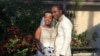 FILE - In this Nov. 9, 2018, photo provided by Nikese Toussaint, Jean-Dickens Toussaint and his wife, Abigail Michael Toussaint, pose for a photo at their wedding in Pompano Beach, Florida. 