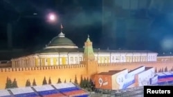 A still image taken from video shows a flying object approaching the Kremlin Senate building during the alleged Ukrainian drone attack in Moscow, in this image taken from video obtained by Reuters May 3, 2023. (Ostorozhno Novosti/Handout via Reuters)