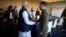 FILE - Ukraine's President Volodymyr Zelenskyy, right, and Indian Prime Minister Narendra Modi shake hands during the G7 leaders' summit in Hiroshima, Japan, May 20, 2023. (Ukrainian Presidential Press Service/Handout via Reuters)