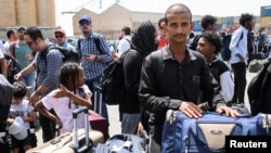 Громадяни різних країн очікують на евакуацію у Порт-Судан, 28 квітня 2023. REUTERS/Ibrahim Mohammed Ishak