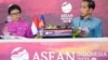 Indonesia's President Joko Widodo (R) and Indonesia's Foreign Minister Retno Marsudi brief journalists at a press conference during the 42nd Association of Southeast Asian Nations (ASEAN) Summit in Labuan Bajo on May 11, 2023.