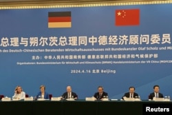 德國總理朔爾茨與中國總理李強在北京出席中德經濟顧問委員會的會議。（2024年4月16日）